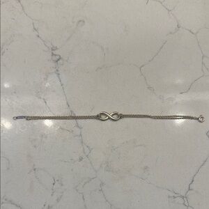 Elegant Tiffany & Co. Silver Infinity Bracelet